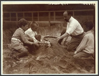 Photograph from 1904: Playing in the sand