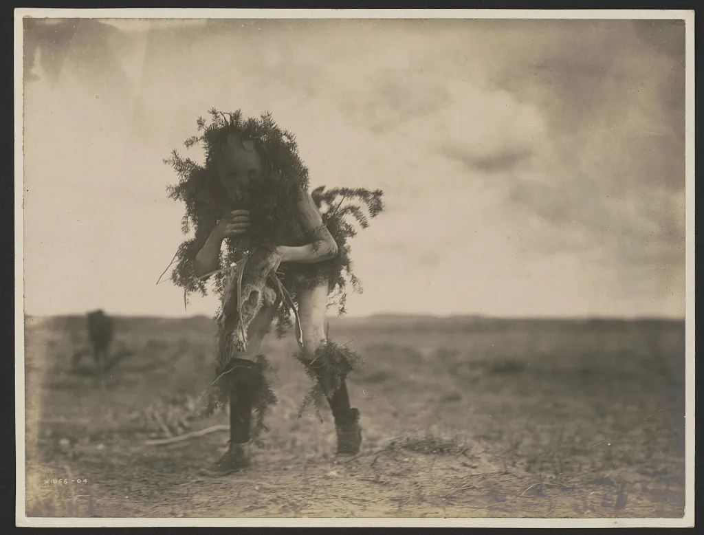 [Yebichai, the beggar, Tonenili-Navajo Indian, dressed in spruce…, 1904