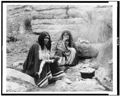 [Two Apache Indian women at campfire, cooking pot in front of one], Women, New Mexico, Domestic Life, 1903