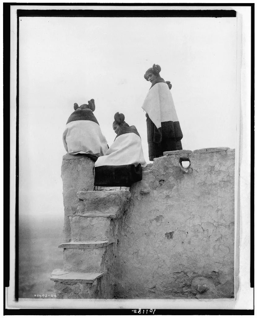[Three Hopi women at top of adobe steps, New Mexico], 1906