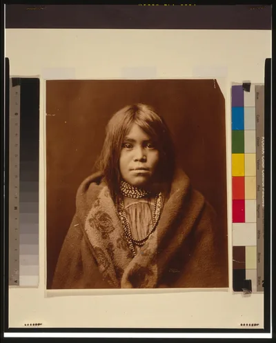 [An Apache girl, head-and-shoulders portrait, facing front, wearing…, 1903