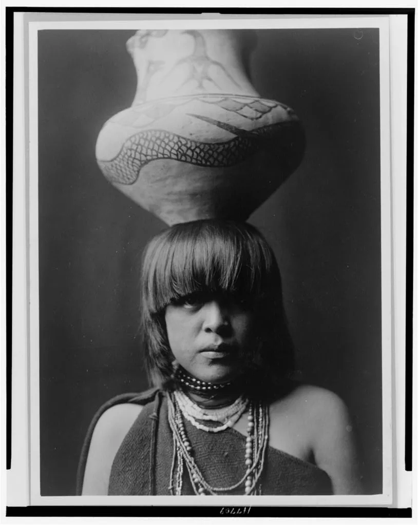 Girl and jar--San Ildefonso, 1927